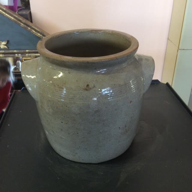 Old sandstone pot of gray color
