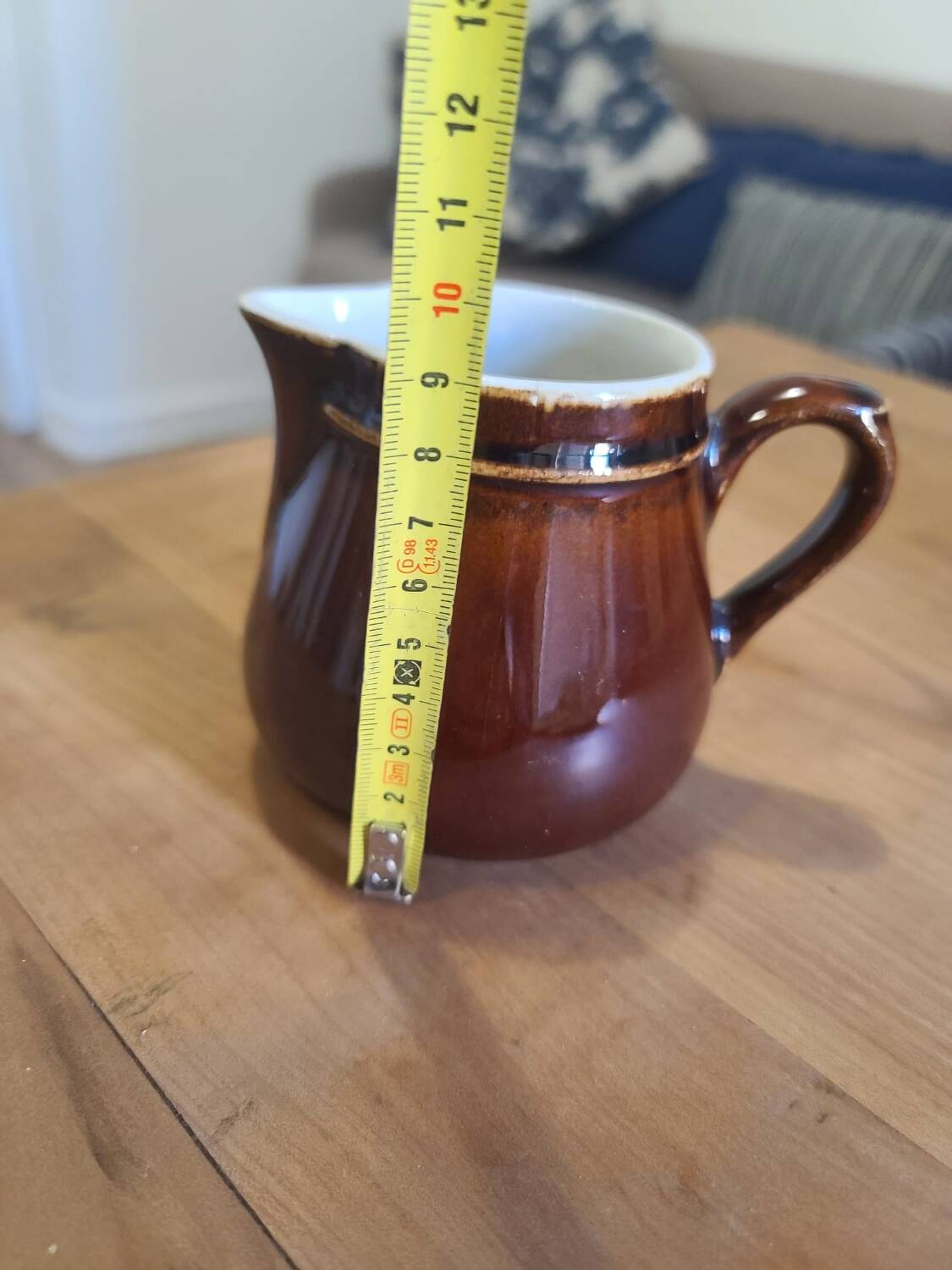 Brown ceramic milk jug