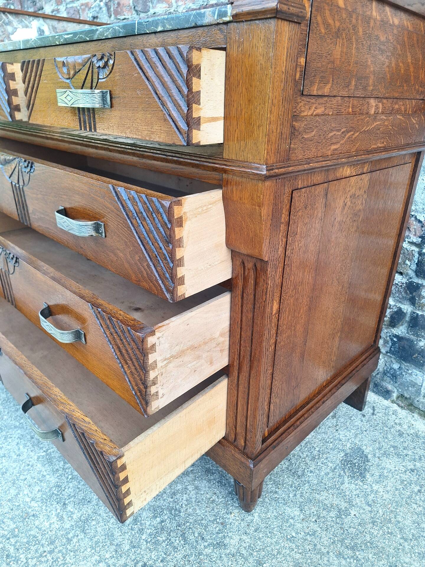 Art Deco commode with marble top, vintage antique furniture.
