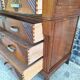 Art Deco commode with marble top, vintage antique furniture.