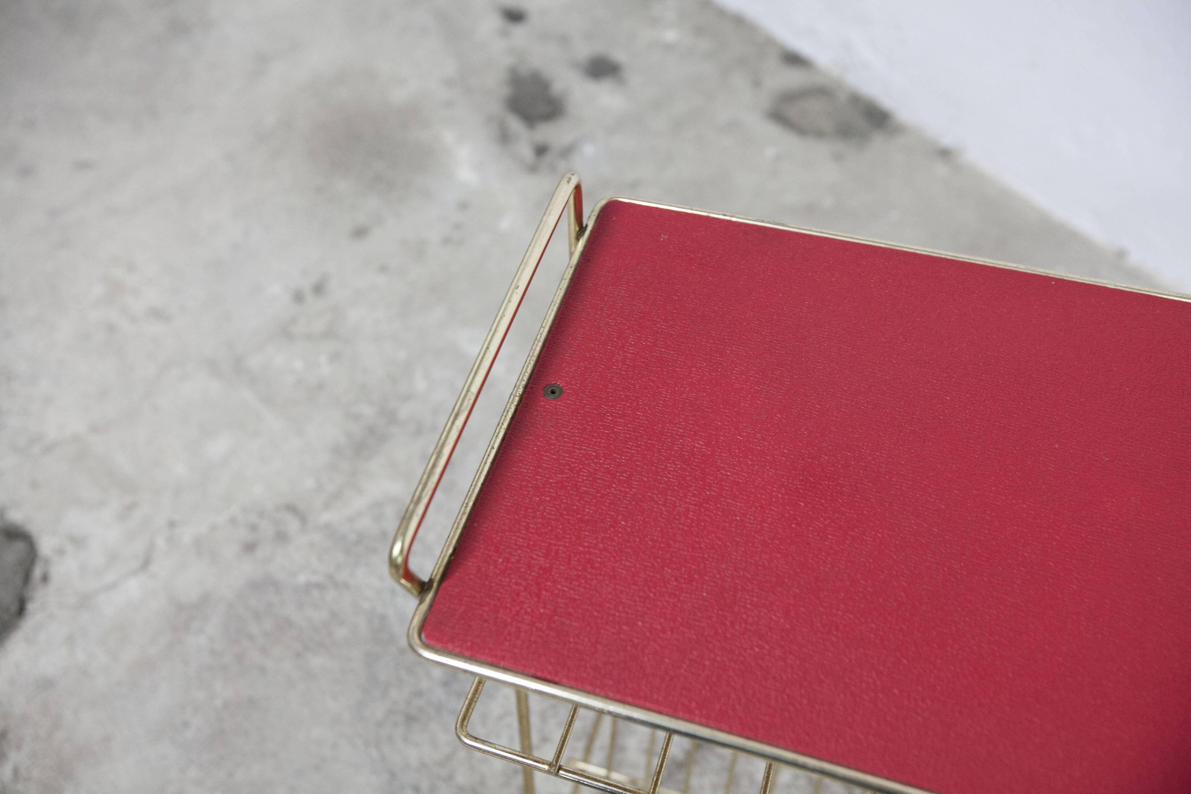 Red vinyl and golden brass server 1960