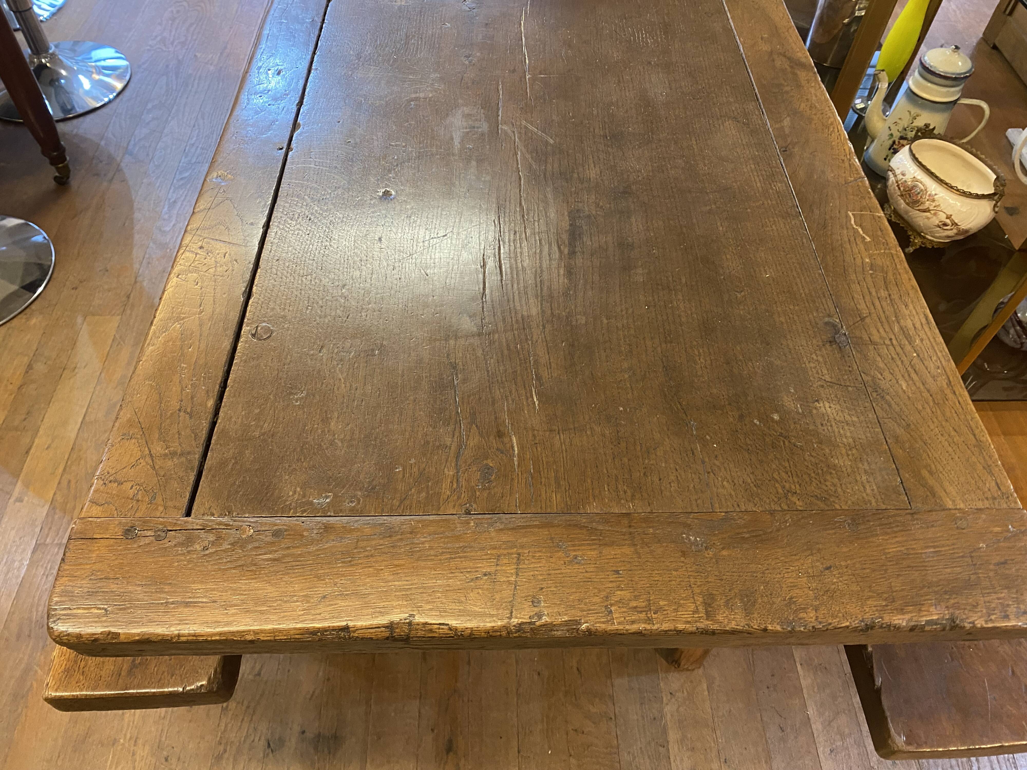 Farm table with its 2 benches.