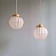 Pair of Art Deco pendant lights in pressed molded satin glass, 1920-30