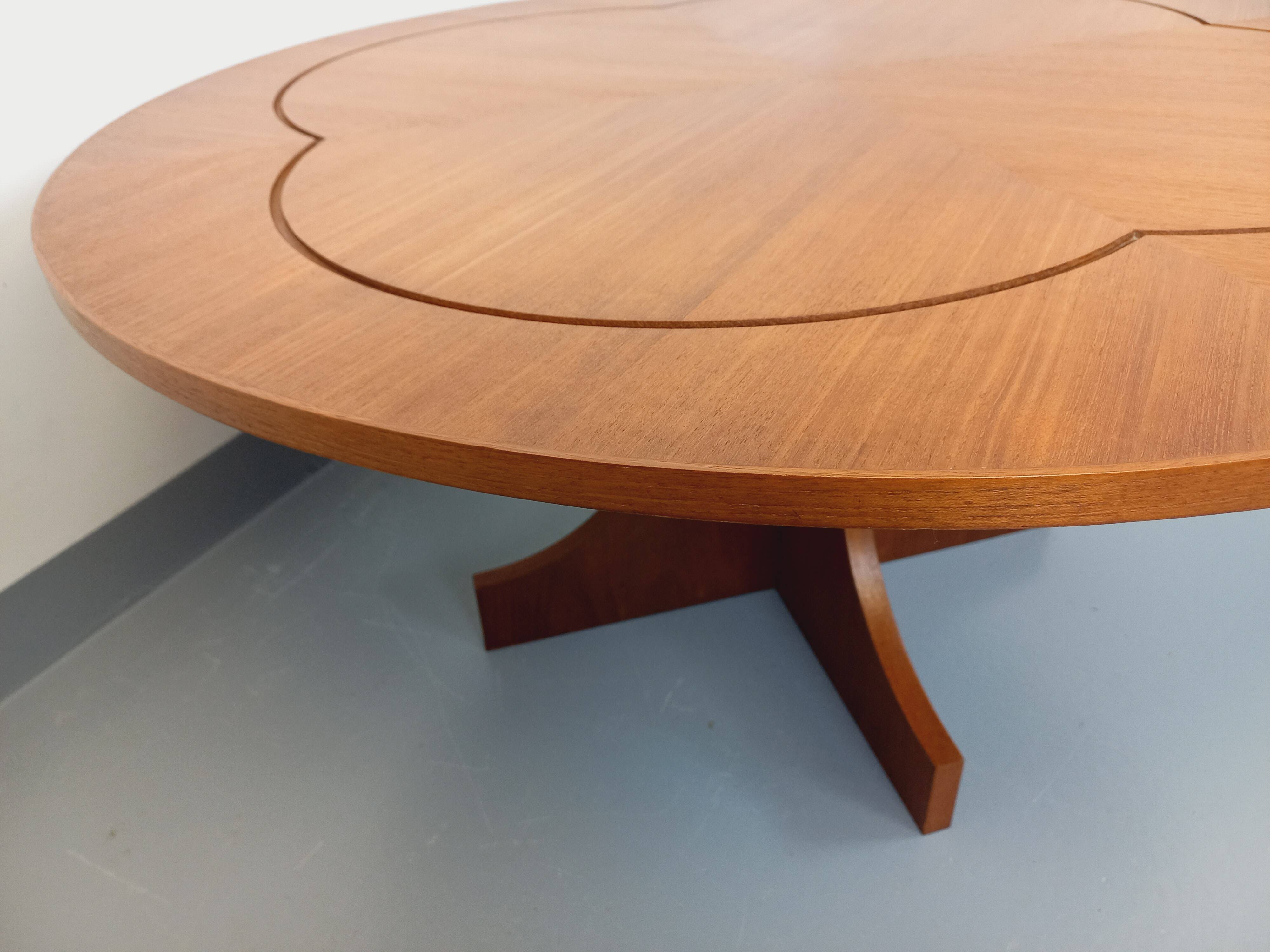 Vintage English round teak coffee table from the 1960s