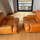 Paire de fauteuils vintage Gérard Guermonprez cuir fauve et inox, France 1970