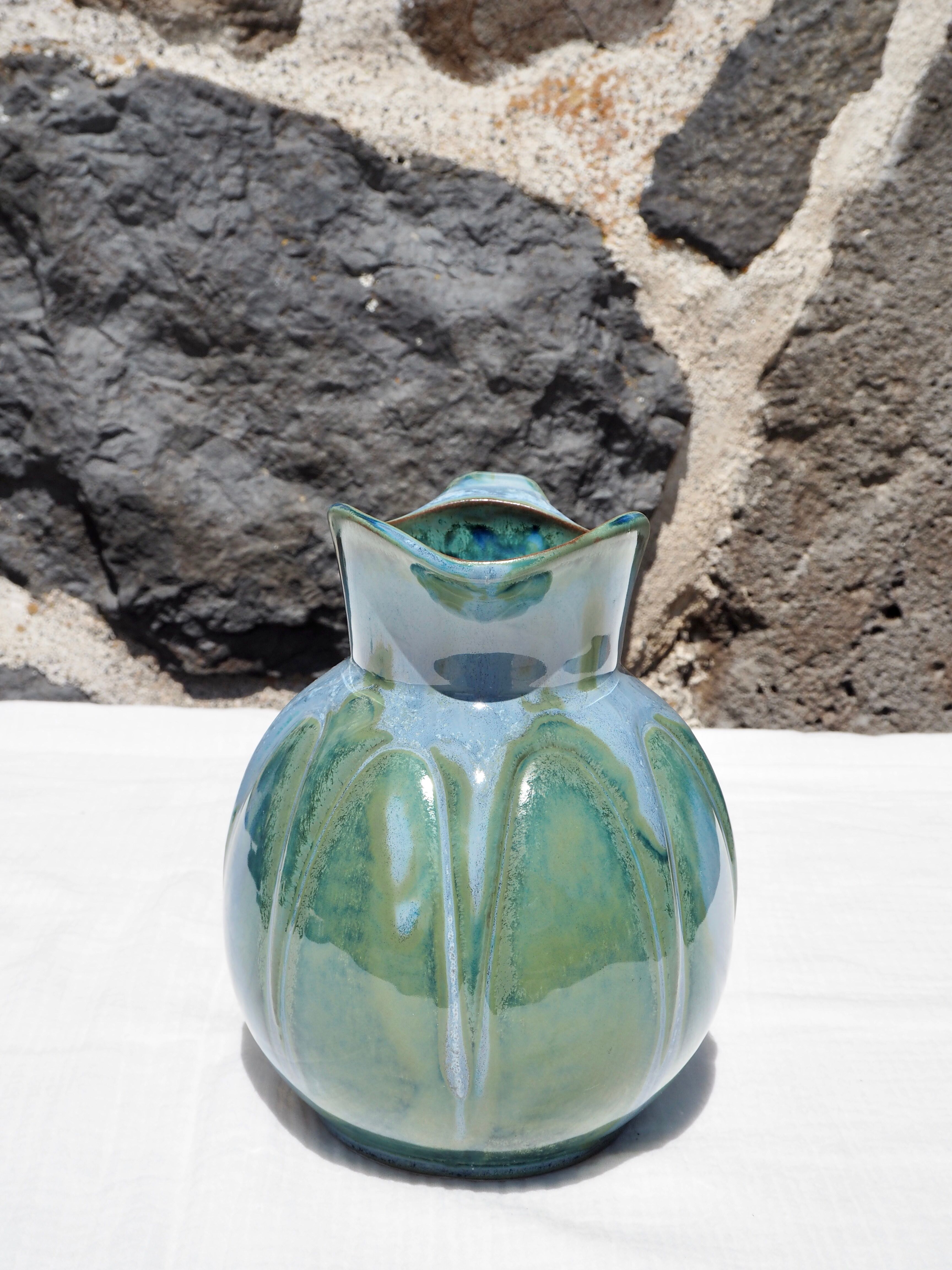 Blue ceramic melon pitcher