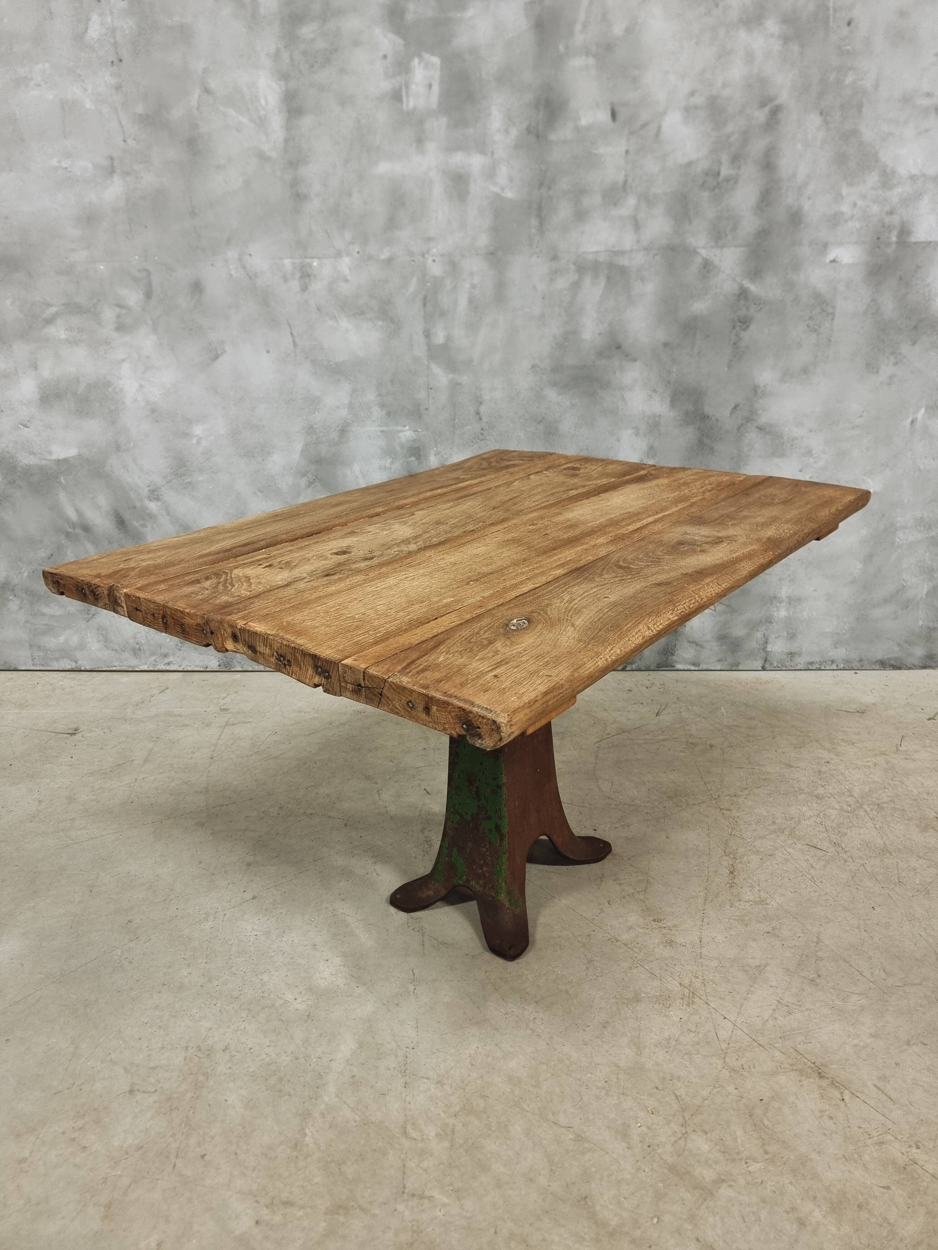 Antique oak dining table on cast iron base 93 x 123 cm