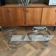 Table basse ovale design années 70 en verre et pieds chromé « S »