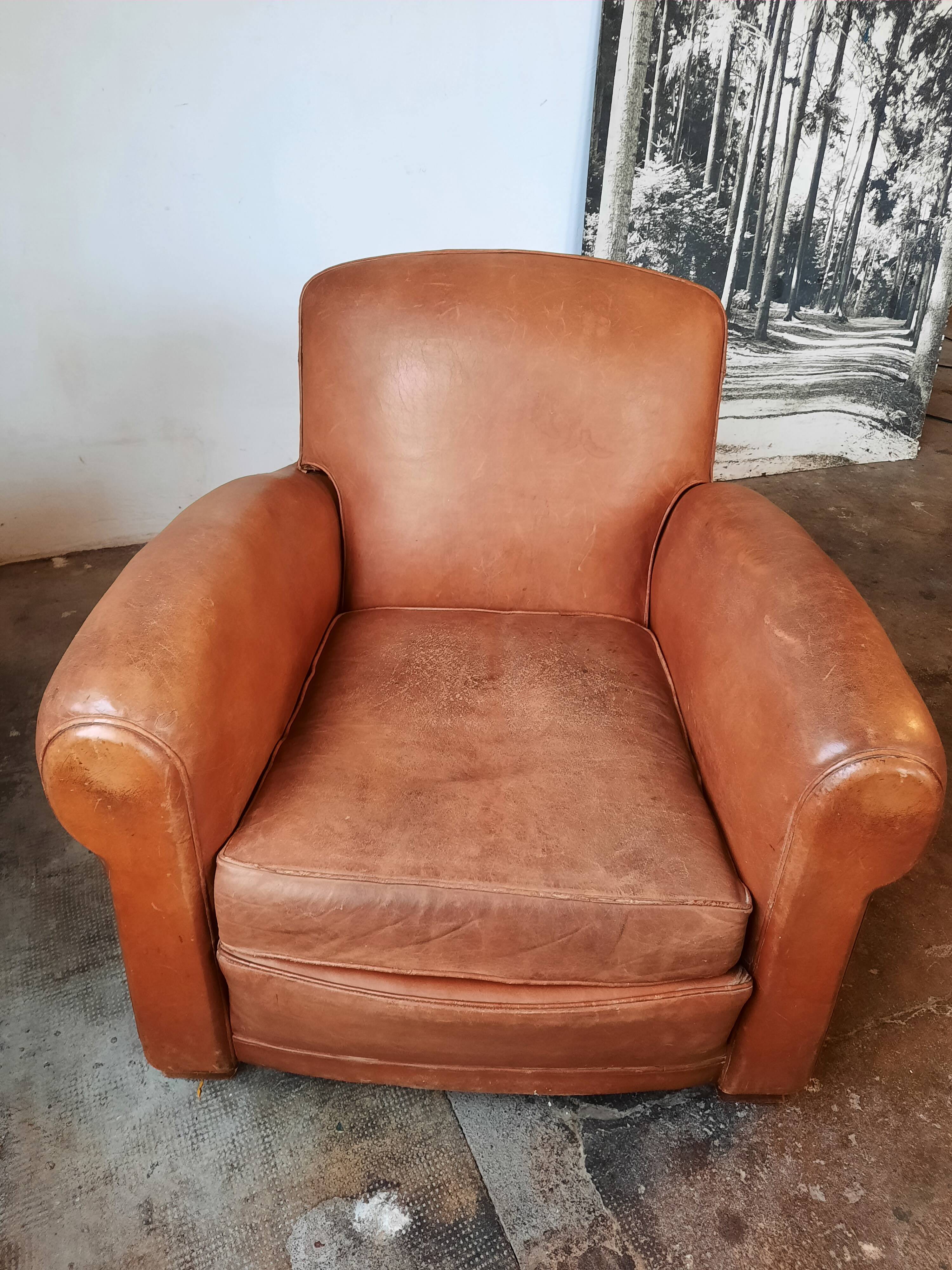 Old leather club chair 1940-1950