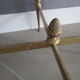 Marble pedestal table and brass hollywood regency