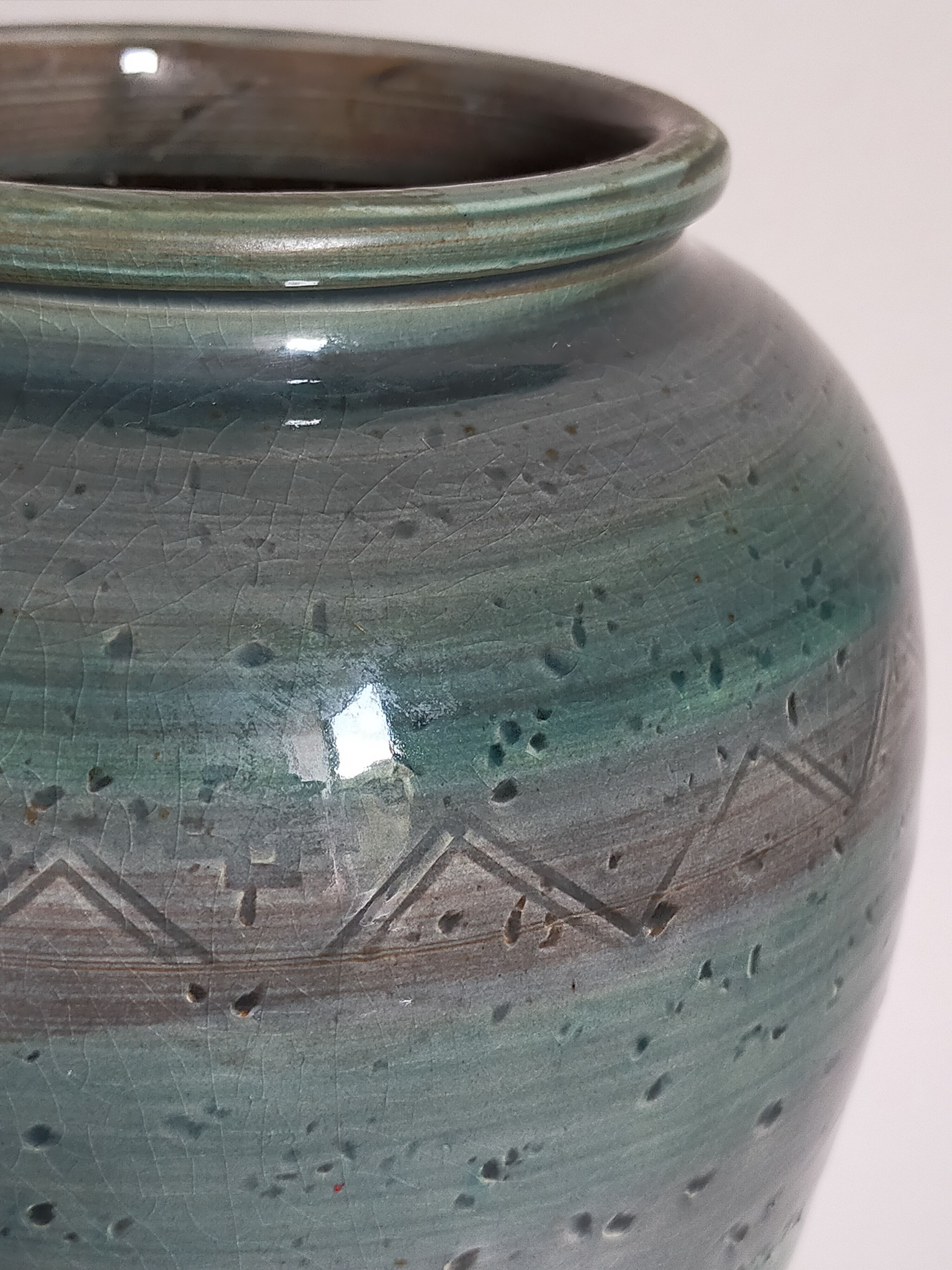 Oblong ceramic vase sacrificed with blue enamel