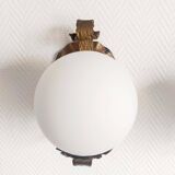 Pair of brutalist wall sconces in gilded metal from around 1970.