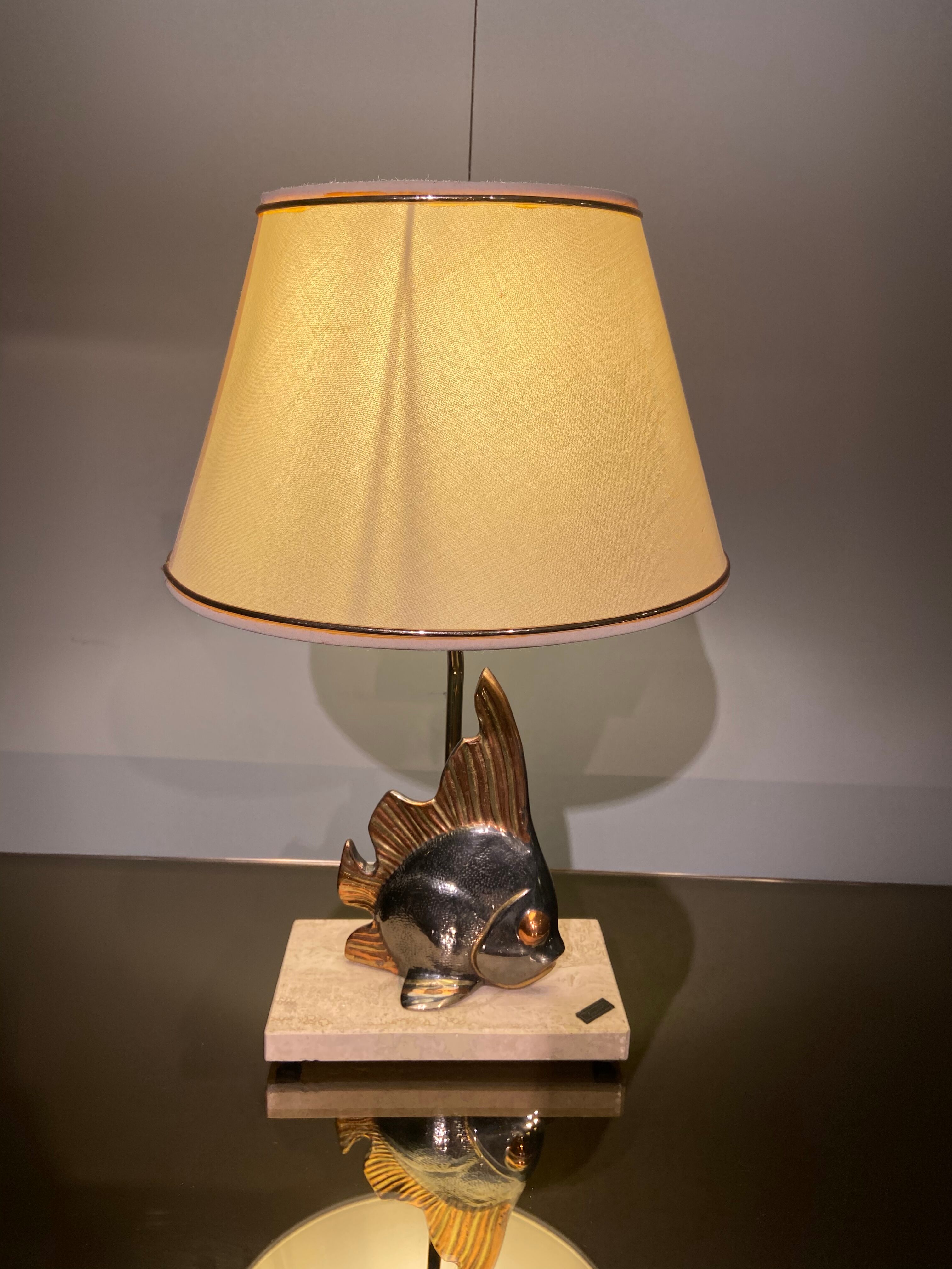 Vintage fish lamp in gold and copper metal