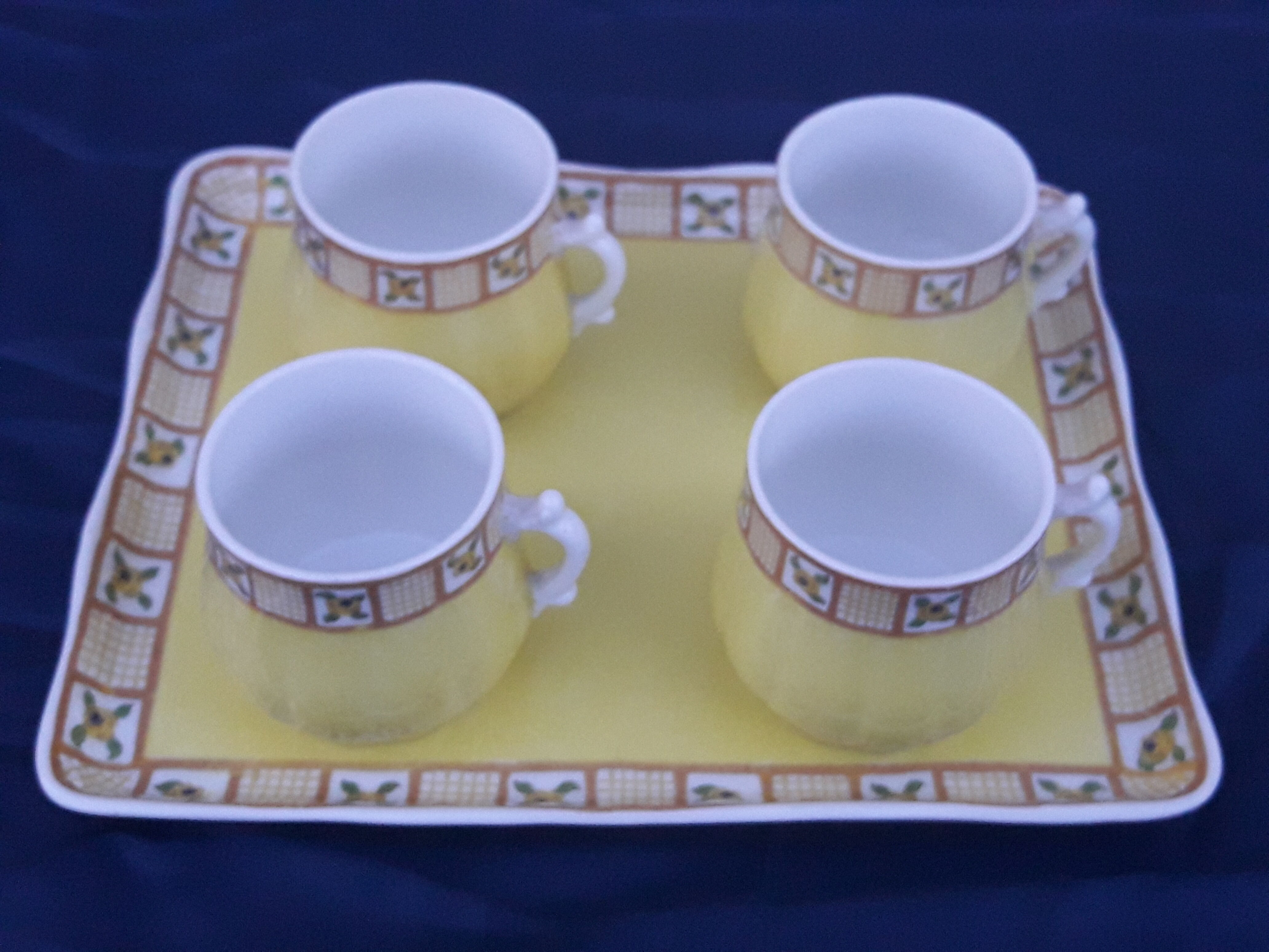 4 cups porcelain mocha service from Limoges Bernardaud and Co.