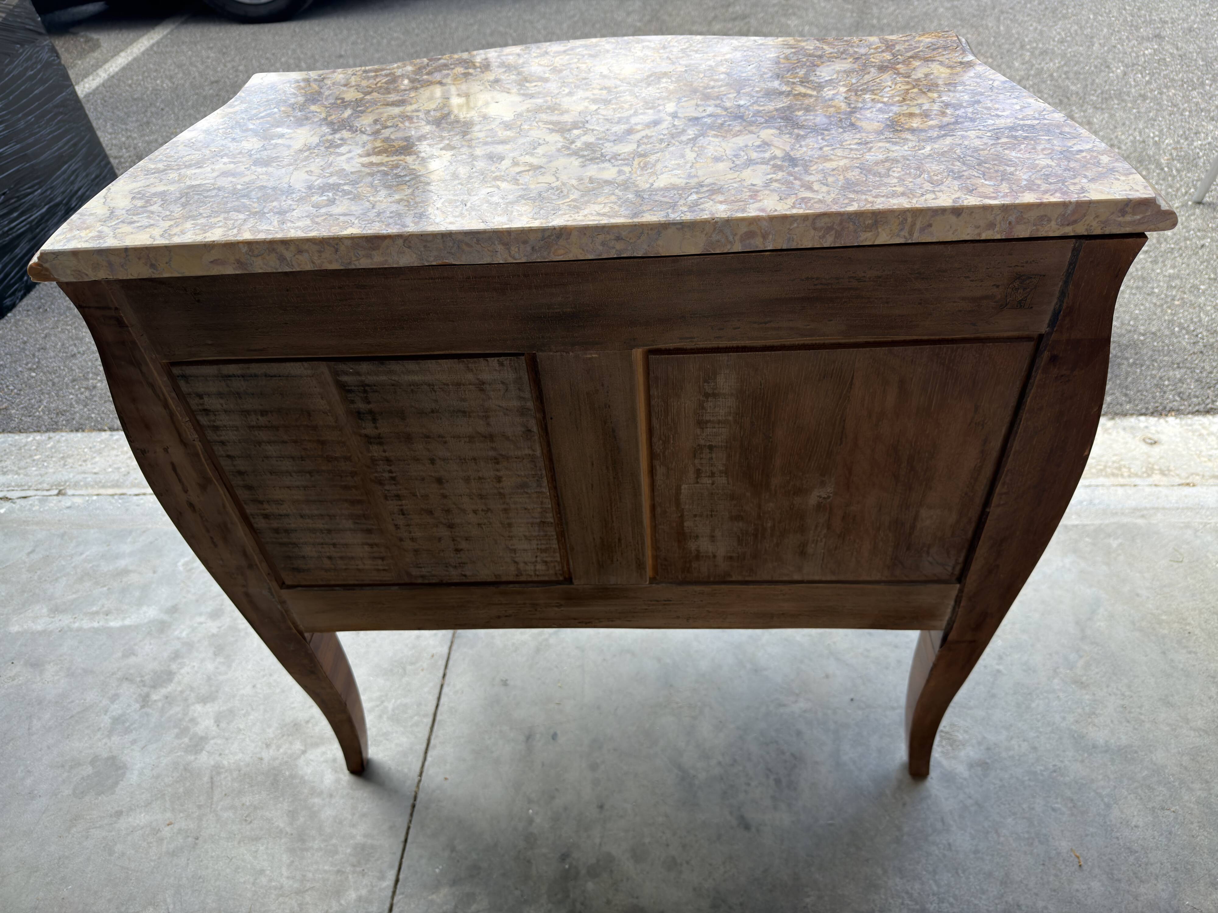 Curved Louis XV style commode with marquetry, marble top.