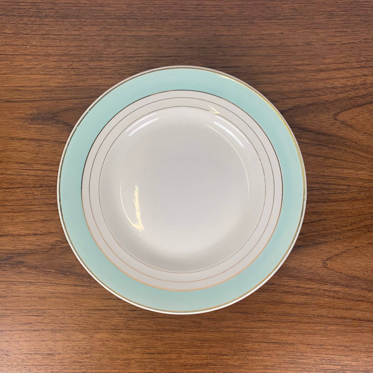 Round Lunéville dish, "Régence" model, water green, late 19th century