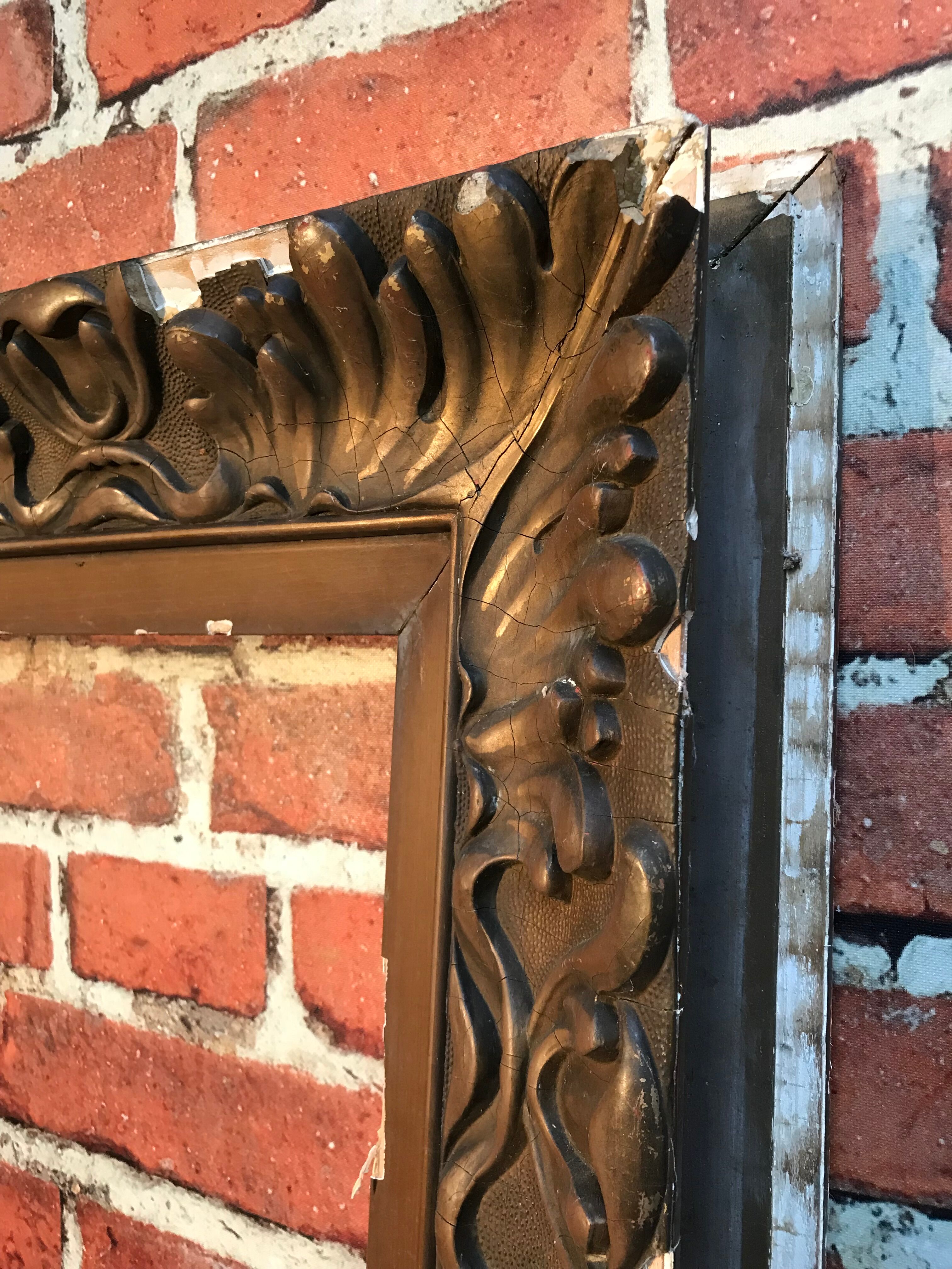 Wooden frame and stucco moldings