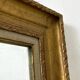 Louis XVI style wood and gilded stucco mirror