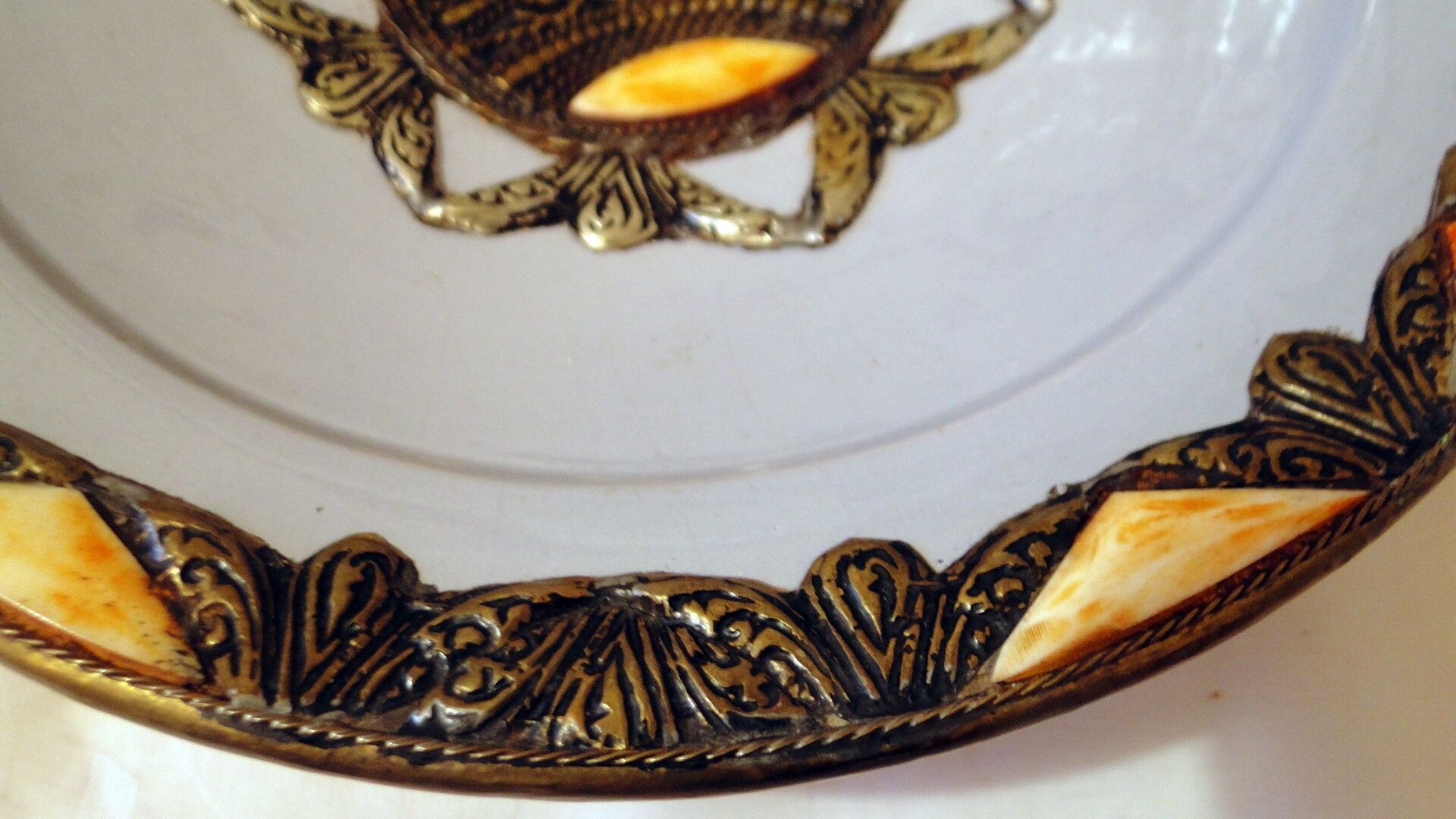Hollow glazed terracotta dish with oriental decor to hang