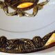 Hollow glazed terracotta dish with oriental decor to hang