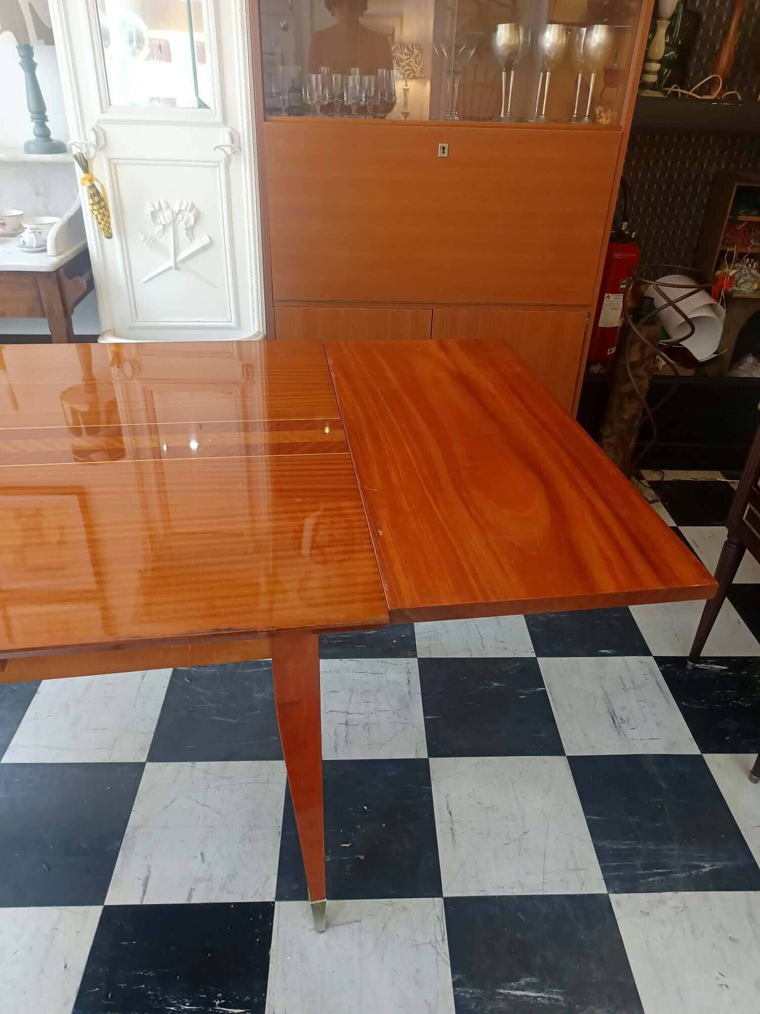 Mid-century vintage coffee table with tapered legs.