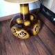 Large vintage ceramic table lamp with rose pattern.