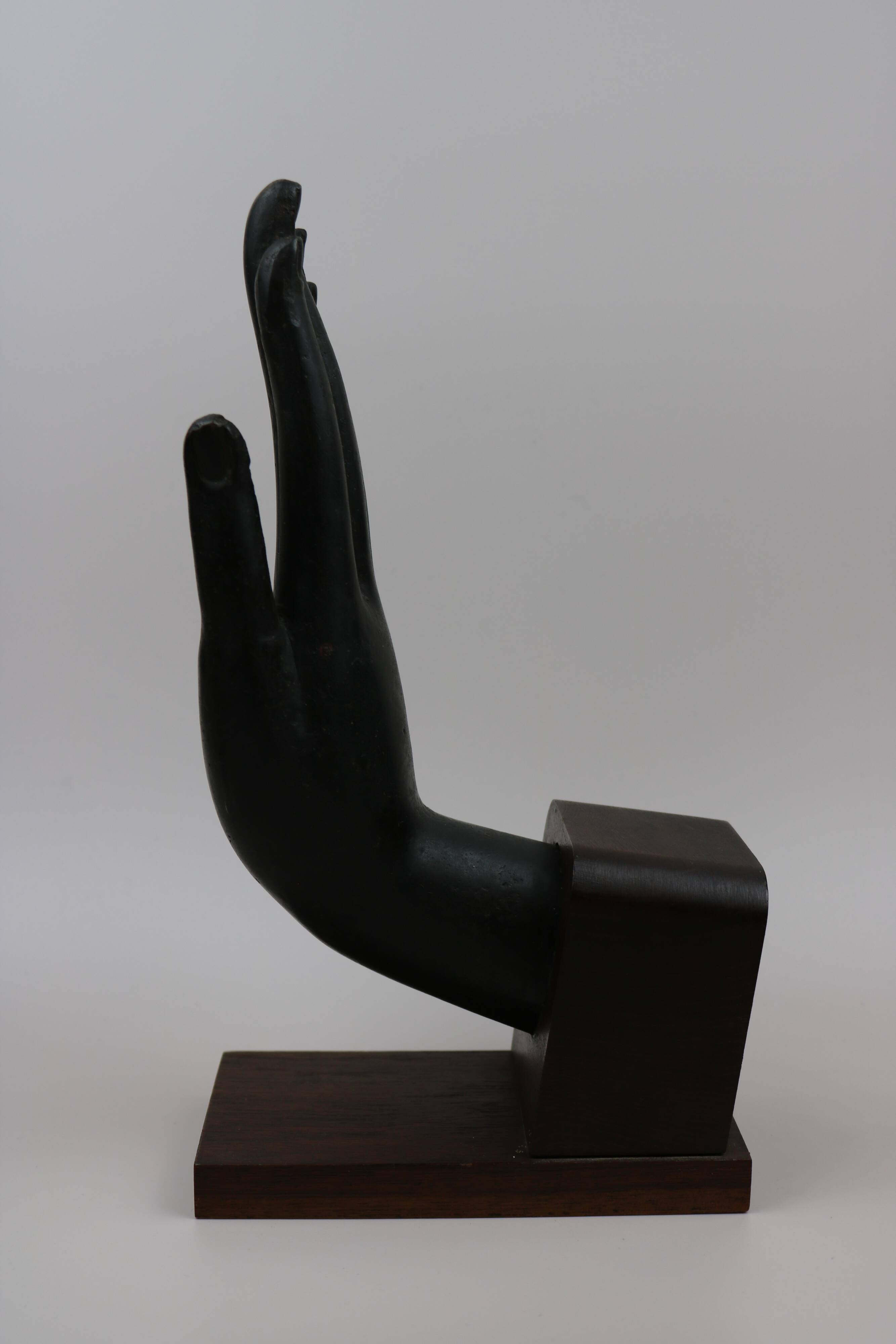 Serre Livre statue main de Bouddha