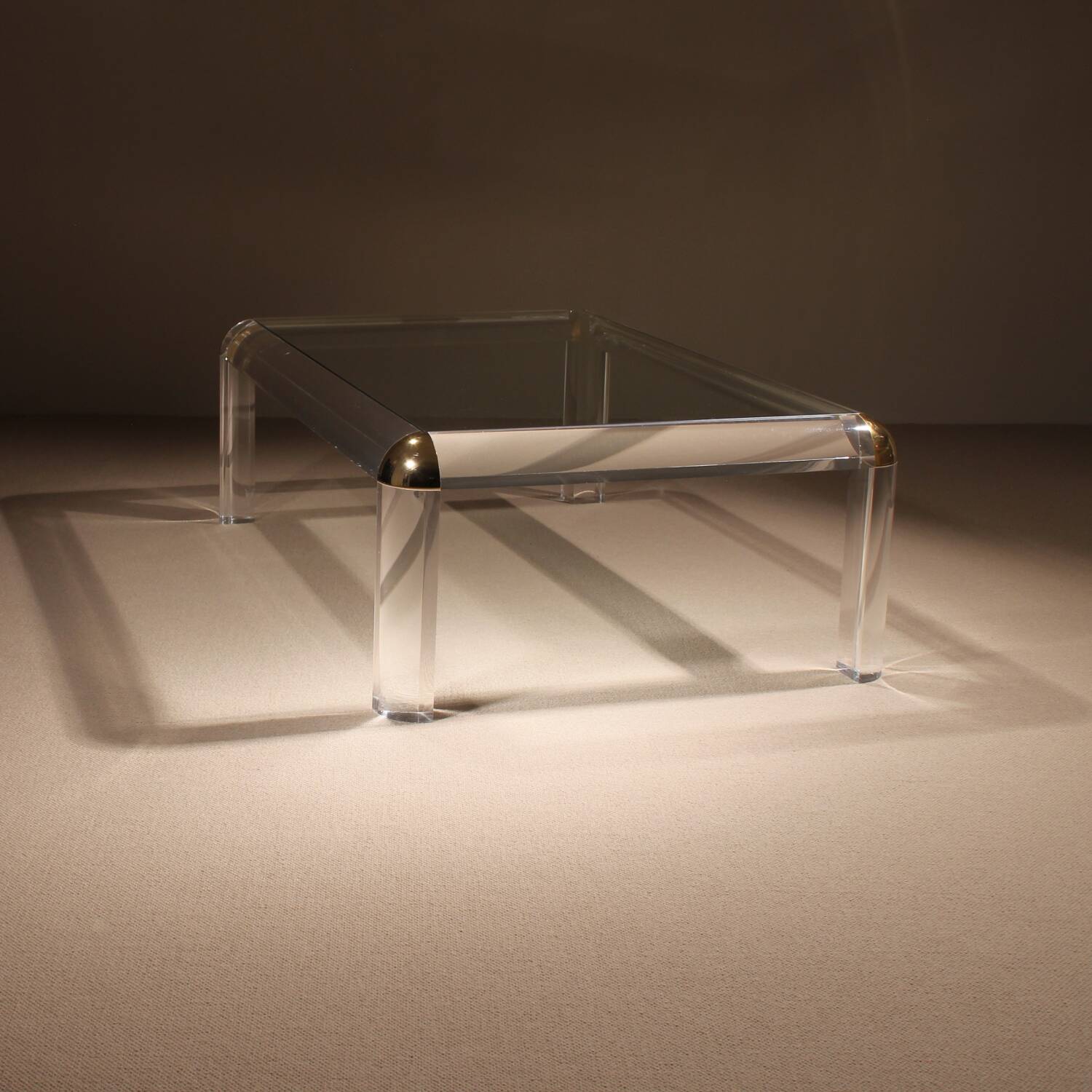 Rectangular Lucite & Brass Coffee Table | Europe 1970s