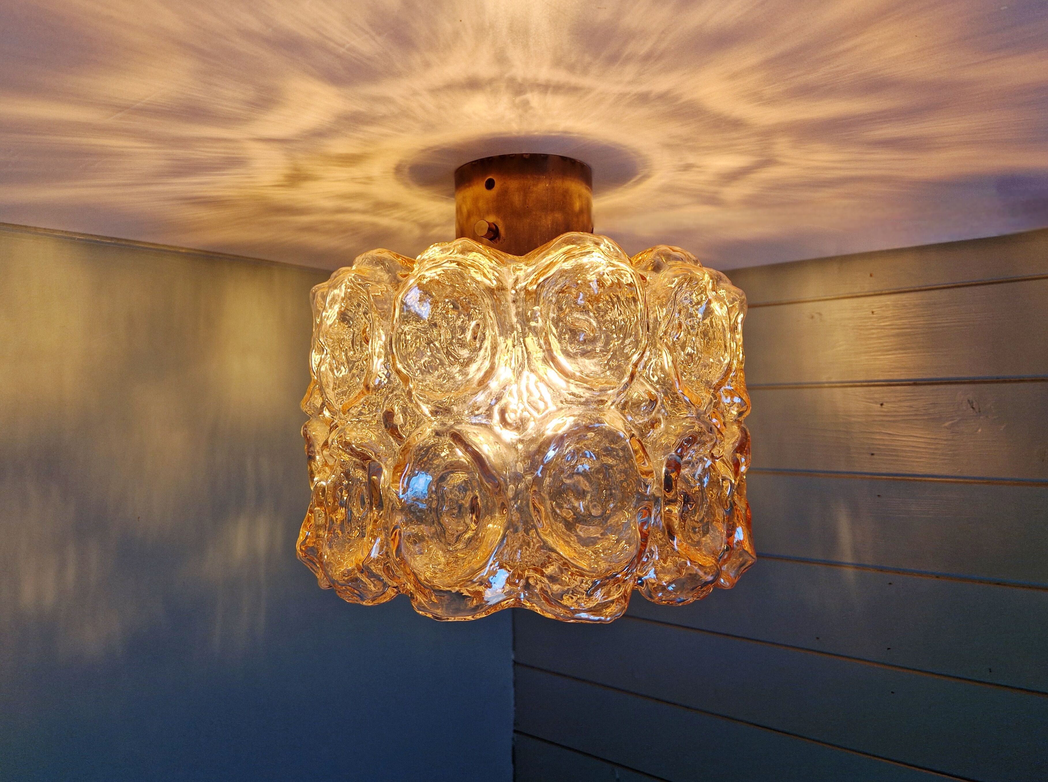 Brass and amber textured glass ceiling light, design by Helena Tynell, Limburg.
