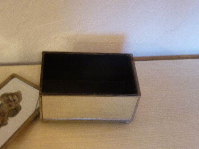 Jewelry box in mirror and metal