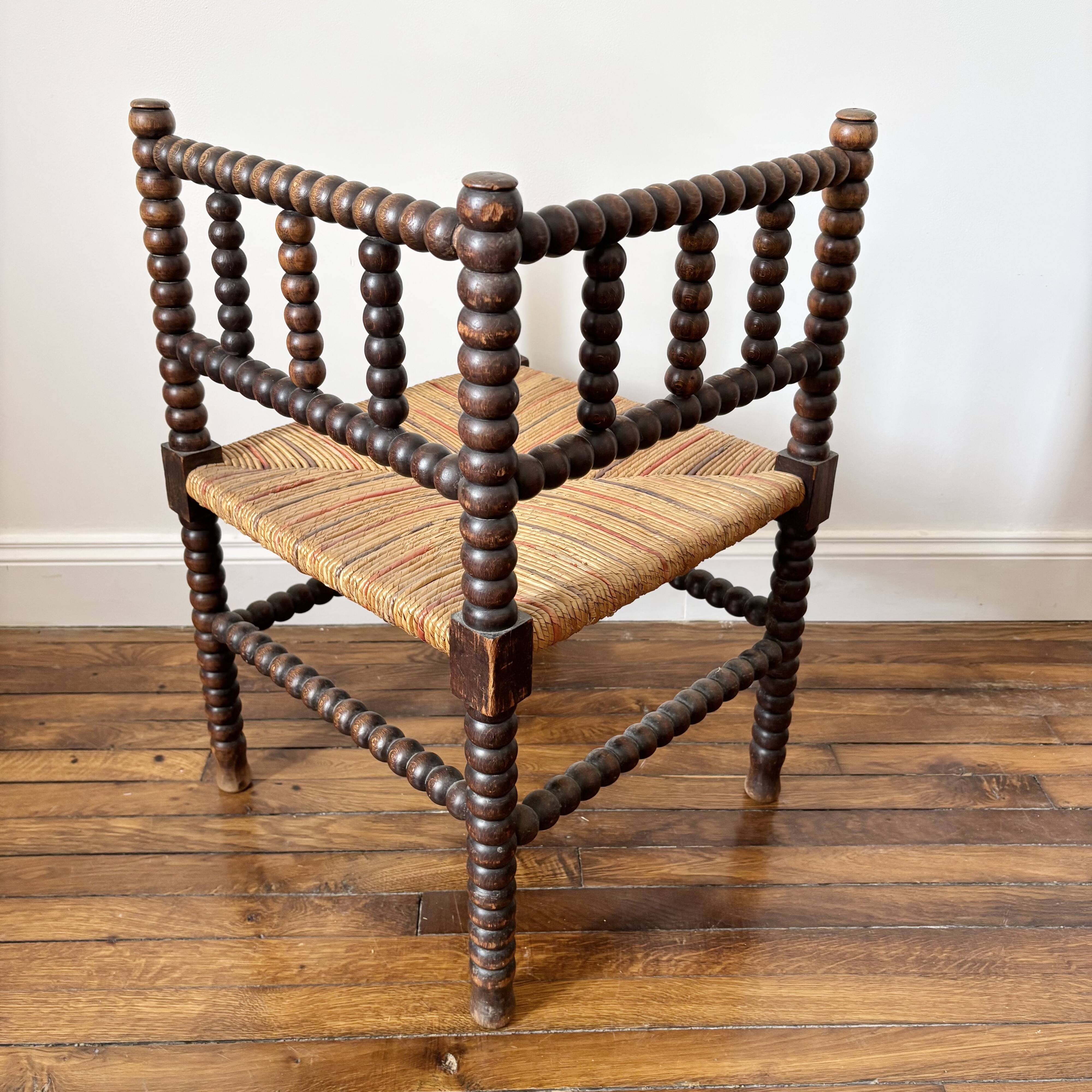 Vintage corner chair in turned wood and straw