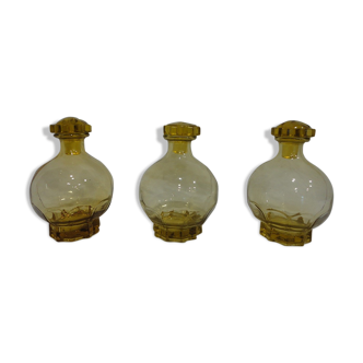 Trilogy of art deco carafes in glass