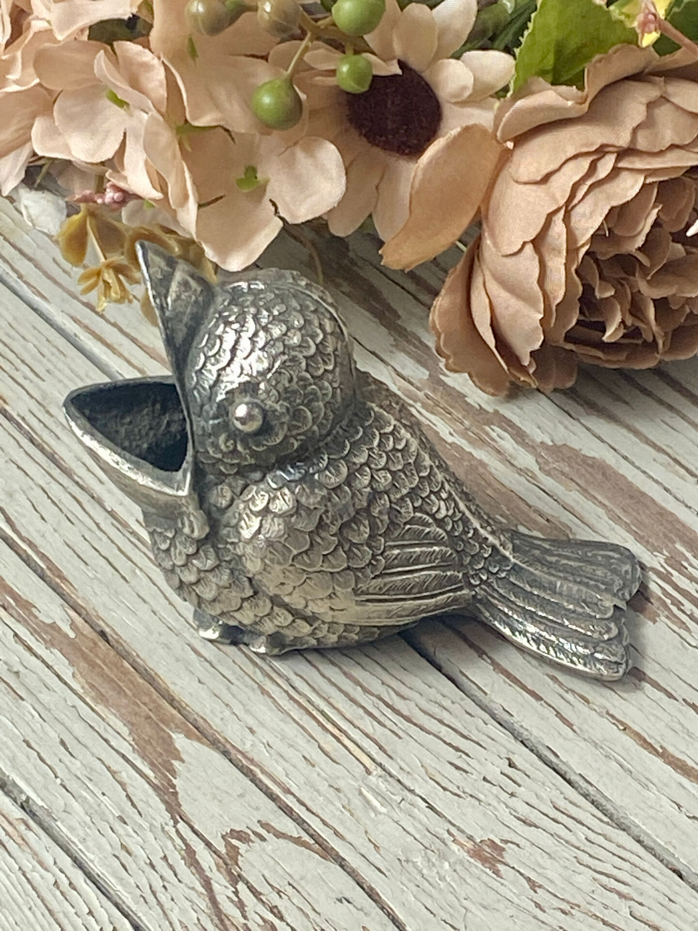 Silver-plated bird