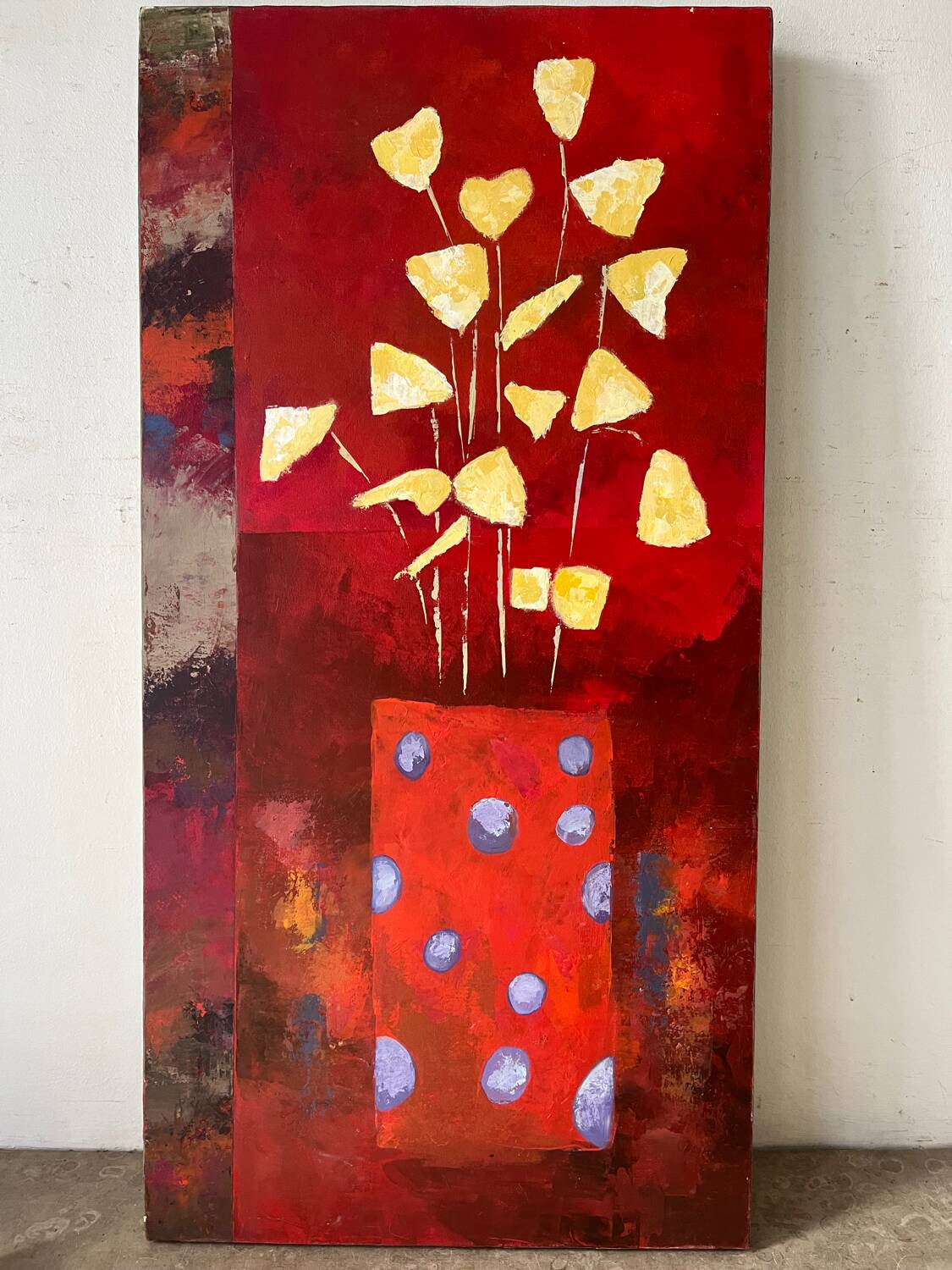 Golden flowers in a polka dot vase