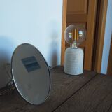Vintage oval mirror on suspended stand