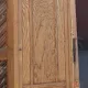 Armoire parisienne étroite ancienne en bois brut 