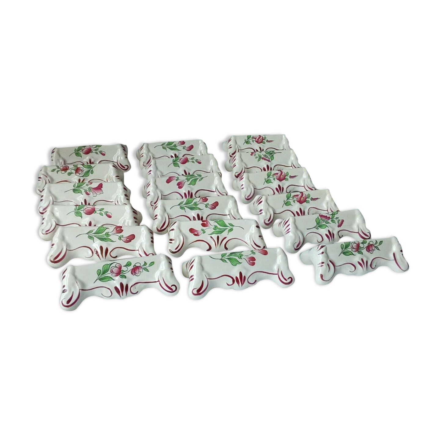 Suite of 18 knife holders in faience of luneville model reverbere