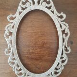 Oval frame molding patinated plant decoration