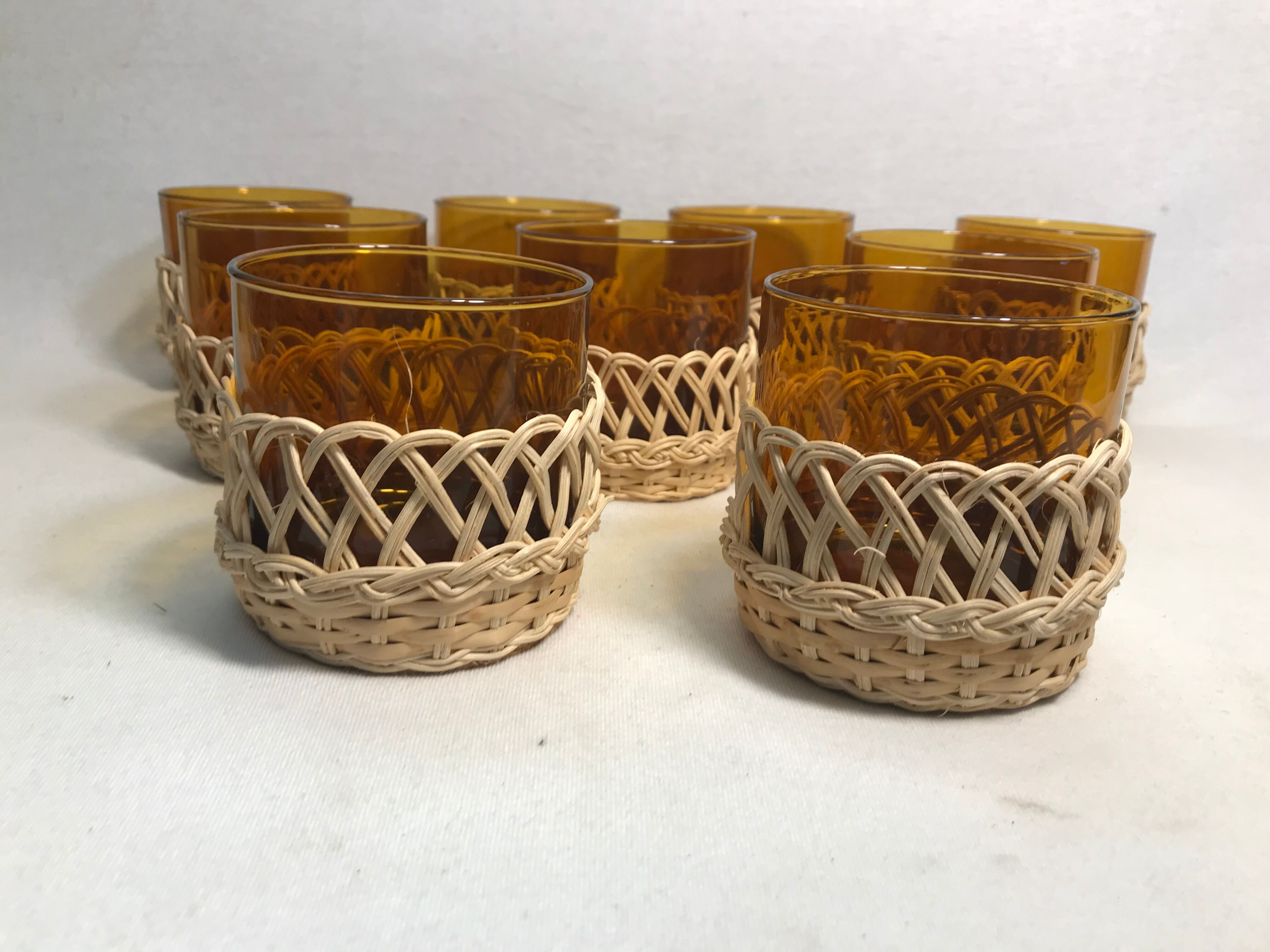 Service old juice carafe and its 9 orange glasses