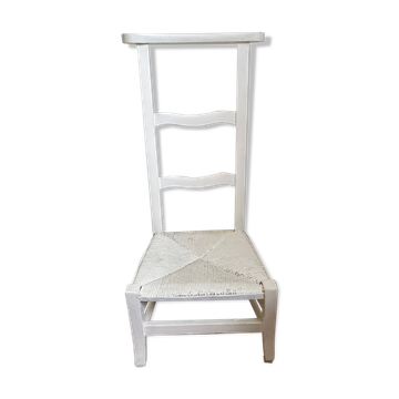 Old white mulched wooden chair