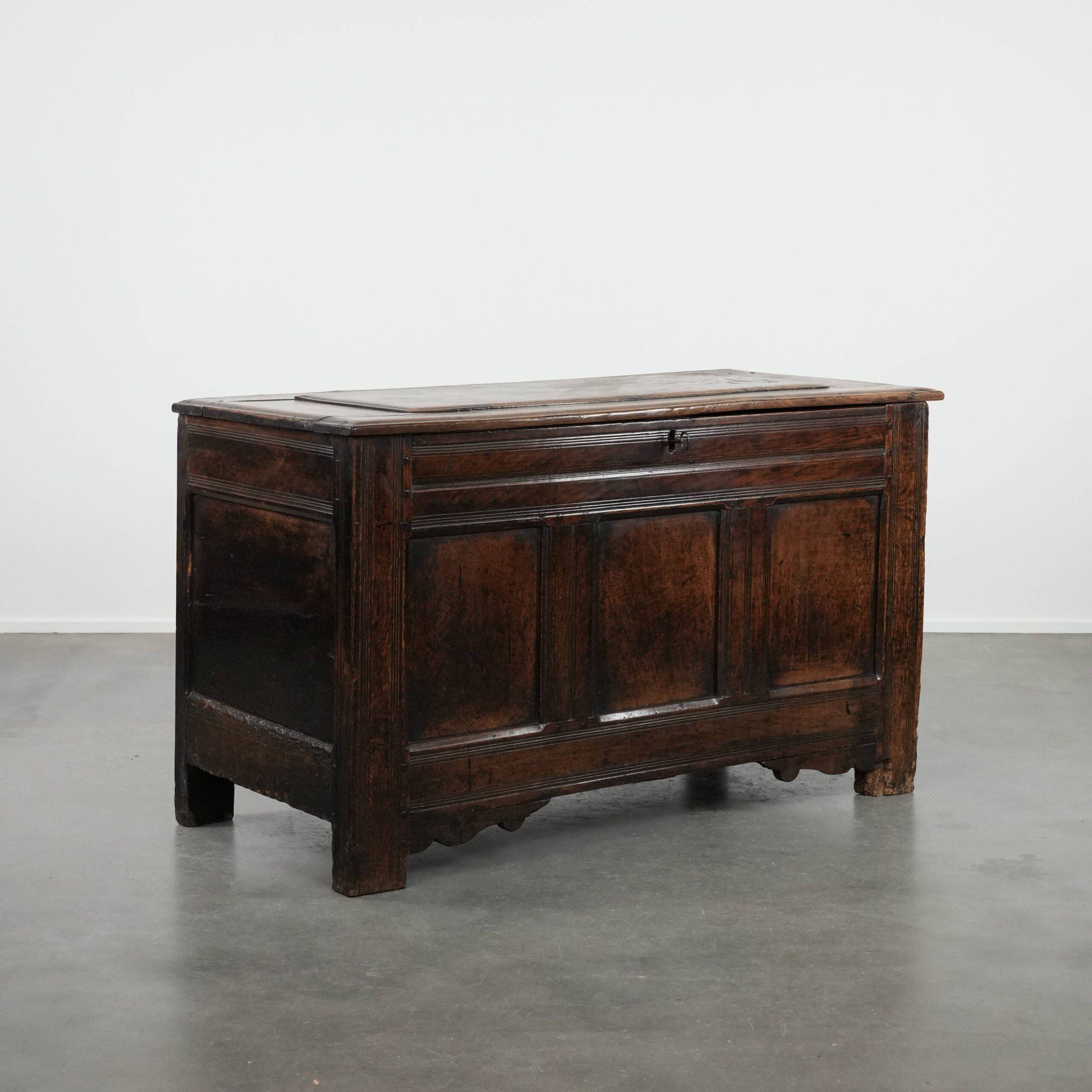 Large antique panelled English oak chest from the 18th century
