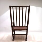 Manou rattan armchair with leather seat, 1960