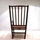 Fauteuil Manou en rotin et assise en cuir, 1960