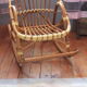 Fauteuil enfant à bascule en rotin