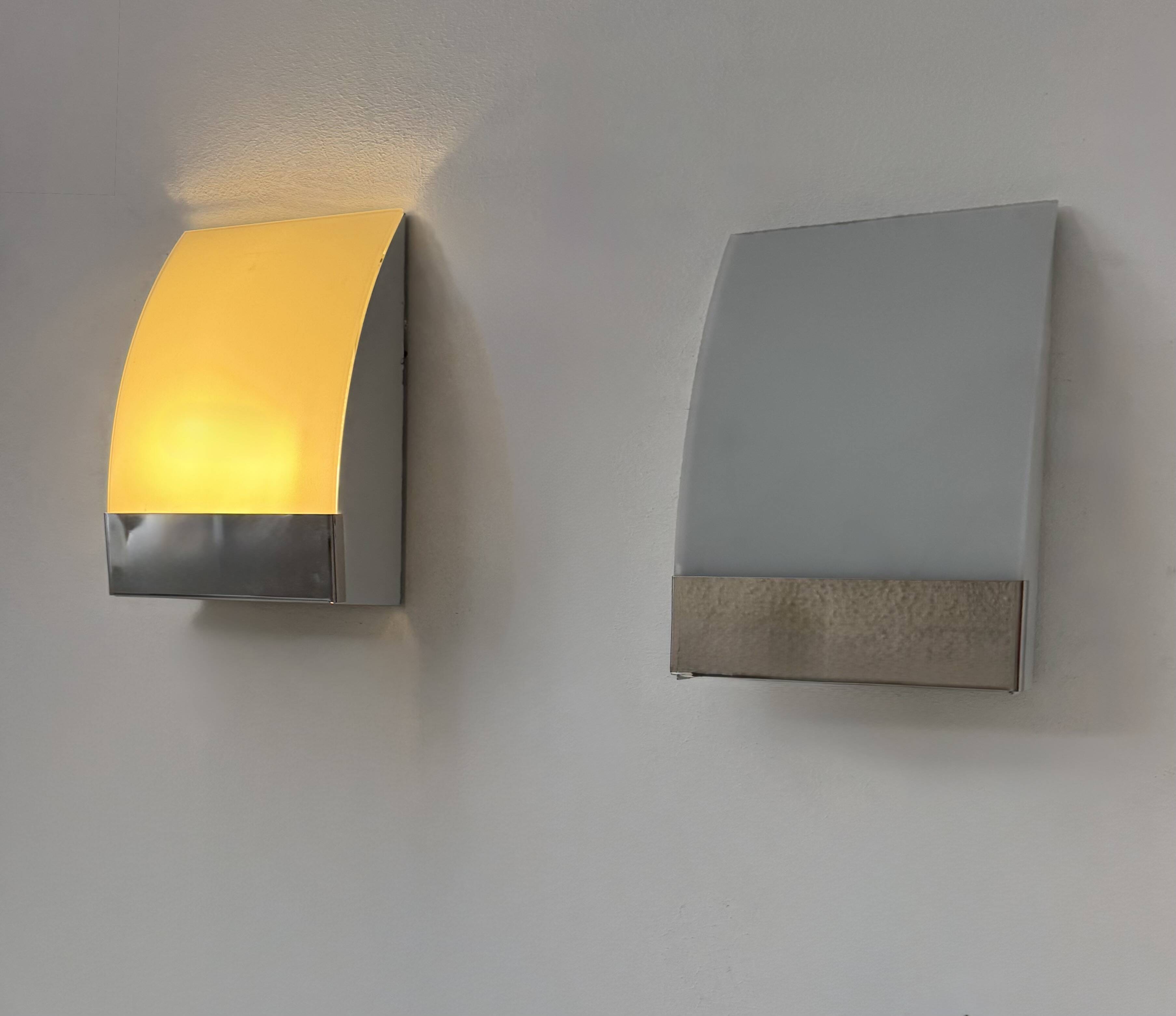 Pair of vintage wall lights, chrome-plated metal and frosted glass, France, 1980