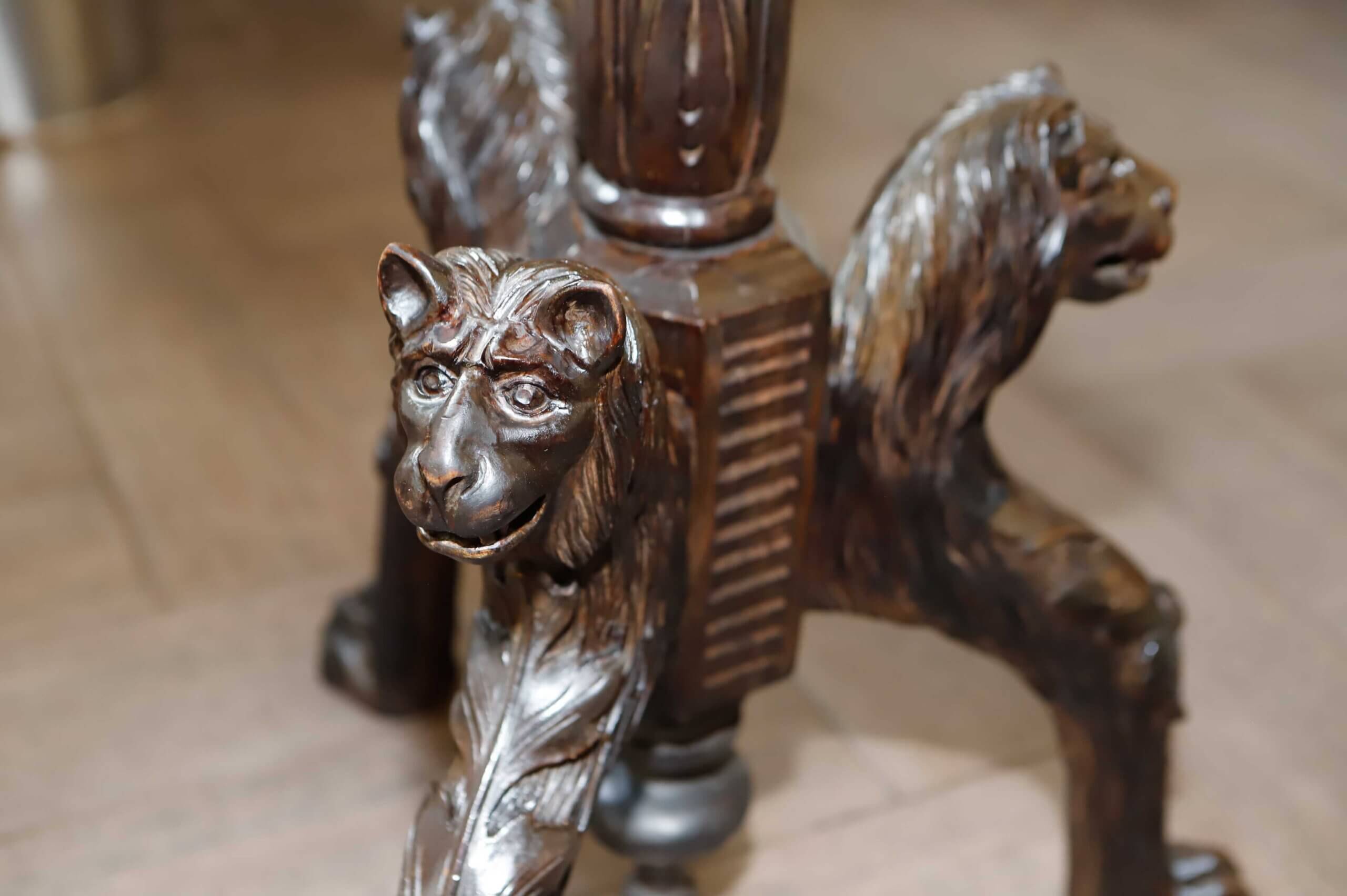 Antique floor lamp with lion motif