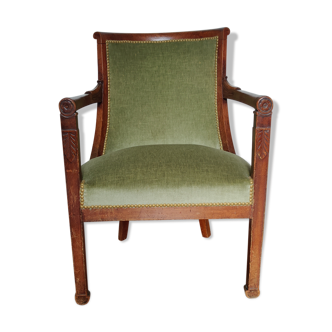 Green velvet armchair