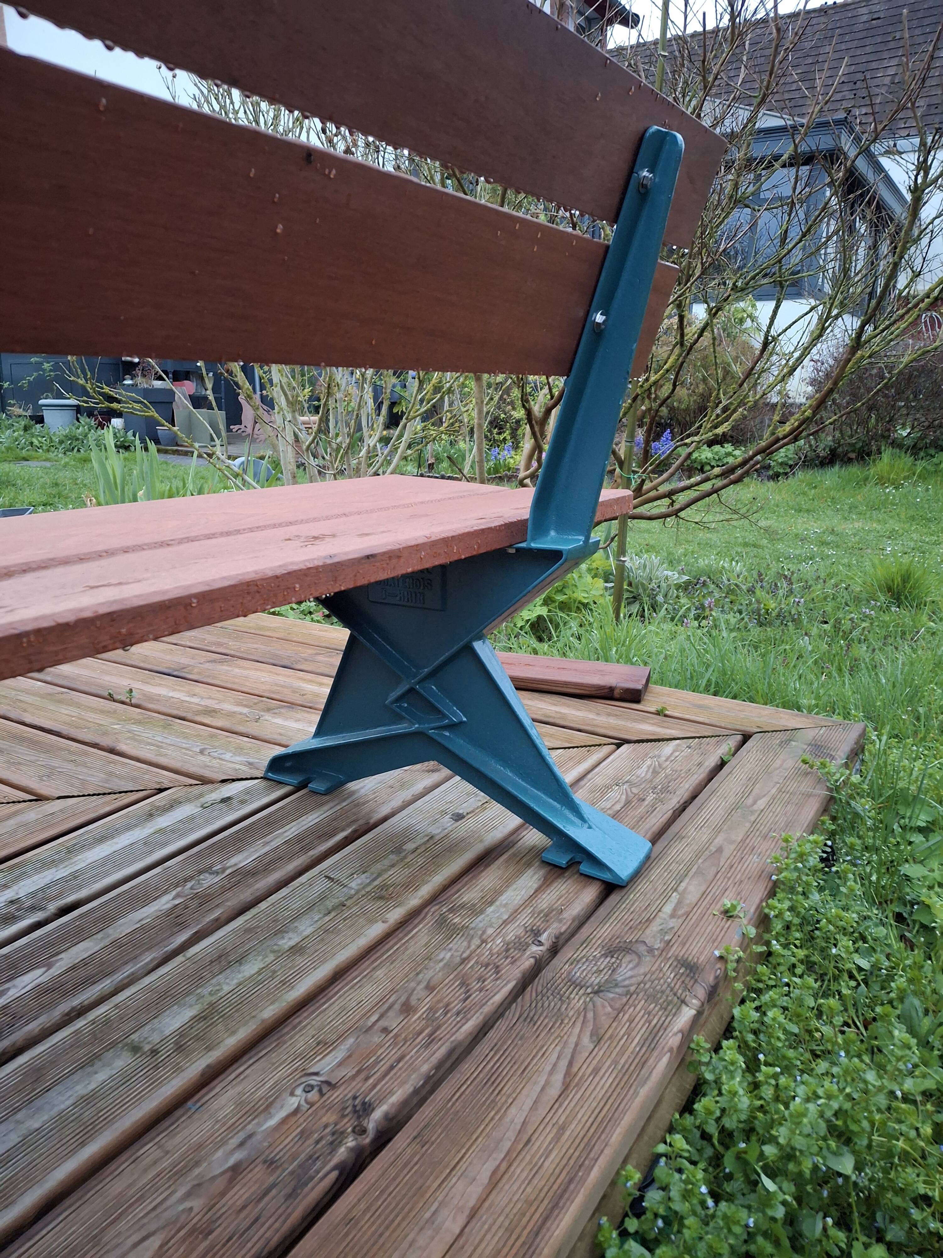 Garden bench, cast iron legs and exotic wood