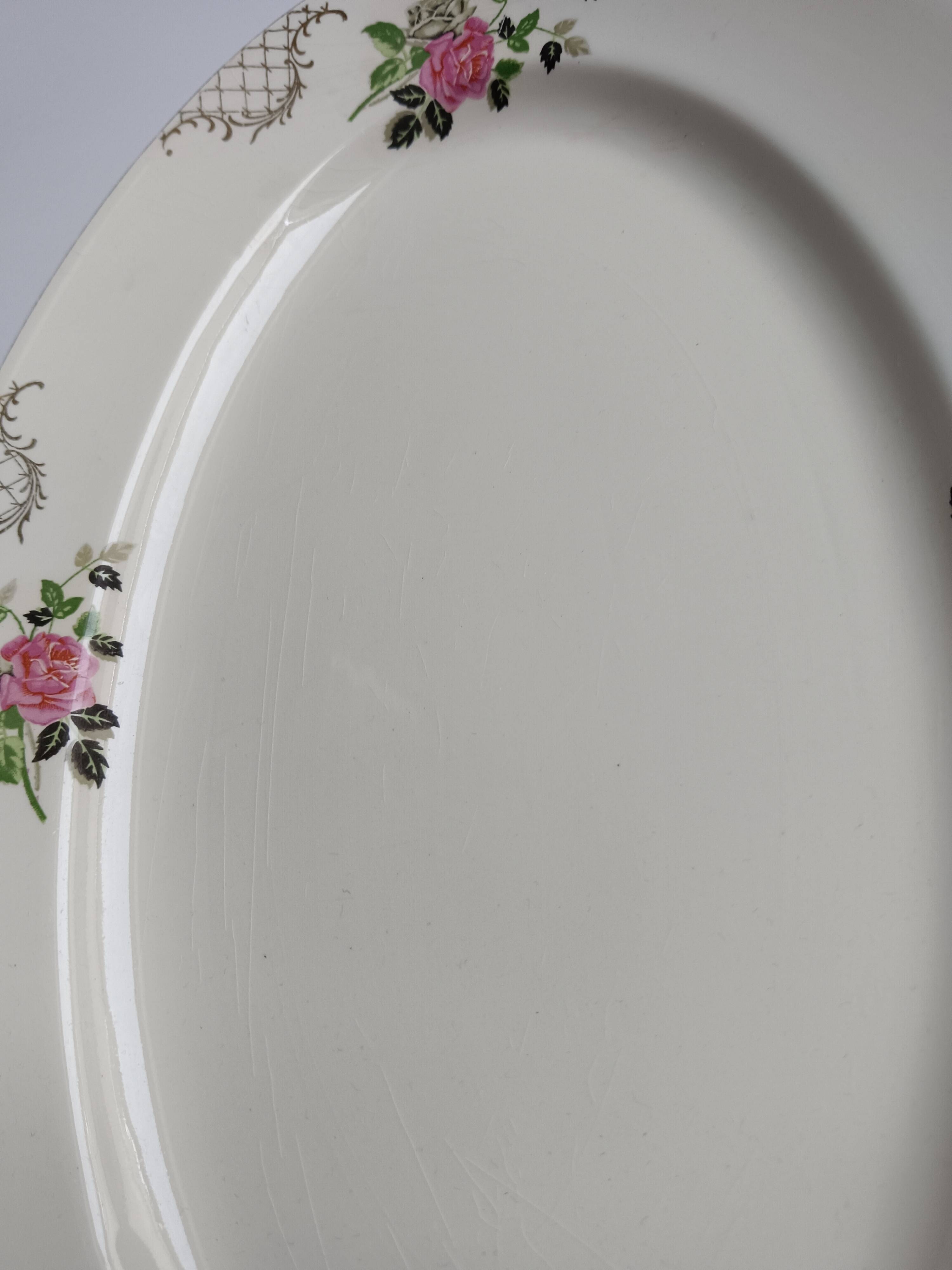 Oval plate Sarreguemines cream with pink gilding, antique.