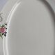 Oval plate Sarreguemines cream with pink gilding, antique.